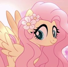 a pink pony with flowers in her hair