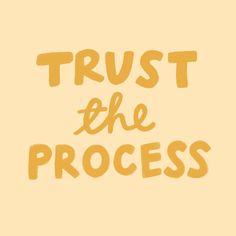 the words trust the process written in yellow ink on a beige background with an orange border