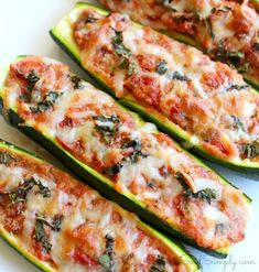 zucchini stuffed with cheese and spinach leaves