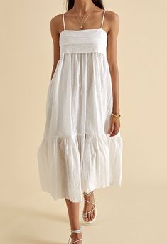 Summer Cotton Voile Dress With Ruffles, Flowy Midi Dress With Ruffled Straps For Daywear, Summer Cotton Voile Dresses For Daywear, White Sleeveless Cotton Tiered Dress, White Midi Dress With Ruffles And Straight Neckline, Casual Cotton Voile Dresses For Daywear, Breezy Tiered Cotton Dress, Sleeveless Cotton Tiered Dress For Daywear, Breezy Cotton Tiered Dresses