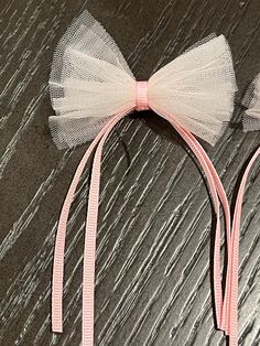 Set of 2 Handmade  Alligator clips attached  size of the bow is about 3in Made with tulle fabric  Beautiful and chic hair bow to make any outfit  pop. the layers of the tulle can be fluffed to make it more fluffier.  Has a Barbie feel to the bows.  The perfect hair bow for gifting, birthday girl Tulle Hair Bow, Flower Girl Hair Bows, Tulle Hair Bows, Flower Girl Hair, Chic Hair, Flower Girl Hairstyles, Alligator Clips, Gift Bows, Pink Tulle