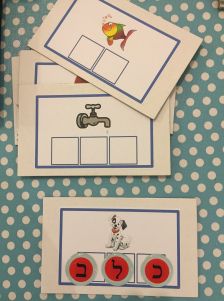 three matching cards with numbers and pictures on them