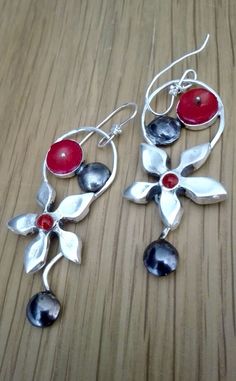 Artisan Red Teardrop Earrings, Red Flower Drop Earrings, Red Nickel-free Chandelier Earrings As Gift, Handmade Red Sterling Silver Earrings, Red Fusion Drop Earrings, Unique Red Flower Earrings, Red Fusion Style Drop Earrings, Unique Nickel-free Dangle Flower Earrings, Unique Nickel Free Dangle Flower Earrings