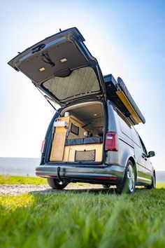 the back end of a van with its trunk open