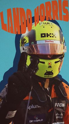 a man wearing a yellow helmet and holding his hand up to his face with the words lando worris on it