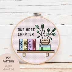 a cross stitch pattern with the words, one more charter and a potted plant