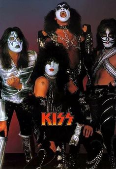 kiss band members posing for a photo