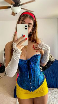 a woman in a corset taking a selfie