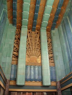 the inside of an ornate building with columns