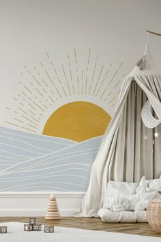 a child's bedroom with a teepee tent and sun mural on the wall