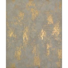 an old wall with gold paint on it