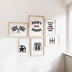 a wall with some framed pictures hanging on it's side next to a radiator