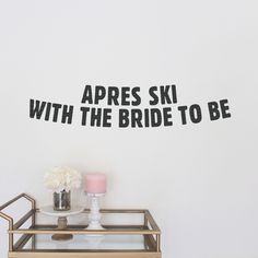 there is a sign on the wall that says apres ski with the bride to be