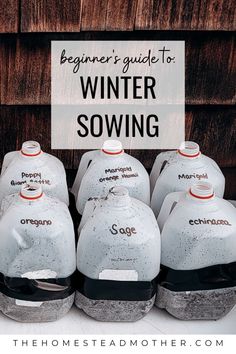 bottles of water sitting on top of a table next to a sign that says beginner's guide to winter sowing