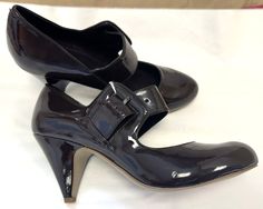 Carvela UK 7.  Eu 40.  US 9. New dark brown faux leather Mary Jane shoes Almond toe Fastens with a wide strap across the foot and a buckle 3.5" (9cm) cone shaped heel Nicely cushioned Condition New / unworn. Will be shipped in a suitable box. Materials Upper: Manmade Lining: Manmade Sole: Manmade Measurements Heel height (measured down centre back of heel on a flat surface): 3.5" (9cm) [AS] Leather Mary Jane Shoes, Dark Materials, Dark Material, Leather Mary Janes, Jane Shoes, Court Shoes, Mary Jane Shoes, Flat Surface