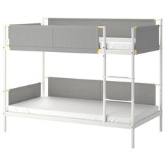 a white bunk bed with grey and yellow trim