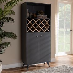 a black cabinet with wine bottles in it