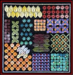 a cross - stitch pattern with many different colors and designs on the front, along with an orange border