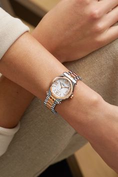 The phrase 'investment piece' gets bandied around too often, but a classic watch is truly deserving of the title. Part of the Chopard's signature 'Happy Sport' collection that was first created in 1993, this 18-karat rose gold and stainless steel timepiece is encased with five free-moving diamonds that glisten as they float across the silver-toned guilloché dial - a concept originally inspired by the dancing droplets of a waterfall. It has beautiful curved edges and links that sit comfortably a… Luxury Watch Accessories With Polished Round Dial, Luxury Business Watches With Rotating Bezel, Luxury Modern Diamond Watch With Round Dial, Best Watches Women Bloomingdale's, Luxury Rose Gold Diamond Watch With Chronometer, Luxury Elegant Diamond Watch With Brilliant Cut, Luxury Stopwatch With Round Dial Watch Accessories, Women Watches Sport, Luxury Round Metal Jewelry And Watches