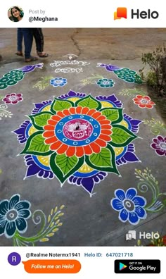 a person standing on top of a cement floor covered in colorful flowers and words that spell hello