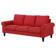 a red couch sitting on top of a white floor