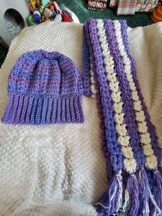 This is a crochet hat and scarf set in purple and white. All of my items are from my smoke free home made with love just waiting to be worn by that special person. If you have any questions please message me. Happy shopping Purple Warm Crochet Hat One Size, One Size Purple Warm Crochet Hat, Warm Purple Crochet Hat One Size, Purple Yarn Crochet Hat, Warm Purple Crochet Yarn Hat, Warm Purple Crochet Hat, Crochet Hat And Scarf Set, Crochet Hat And Scarf, Hat And Scarf Set