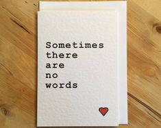 a card that says sometimes there are no words on it with a heart in the middle