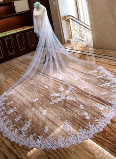 a bridal gown on display in a room