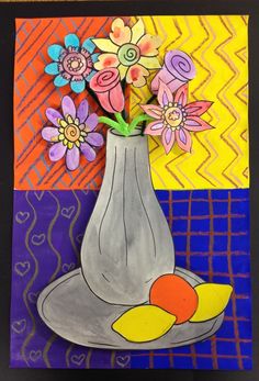 an art project with flowers in a vase and fruit on the plate next to it