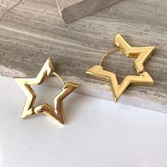 New~ Anthropologie Gold Star Huggie Hoop Earrings In The Shape Of A Star, These Sleek And Simple Earrings Are Great For Everyday! The Huggie Style Hinged Latch Makes Them Easy To Wear. These Would Be A Great Gift! Approx. 1"L, 1"W. Gold-Plated. Nwot. Star Huggie Earrings, Anthro, Preppy Style, Boho Style, Retro, 80s, 90s, Trendy, Brand New Anthropologie Jewelry, Everyday Hoop Earrings, Gold Hoops, Modern, Metallic, Shiny, Holiday, Usa, 4th Of July, Vacation, Patriotic, Shooting Star, Celestial Cute Everyday Earrings, Gold Star Hoop Earrings, Star Gold Jewelry, Gold Everyday Earrings, Star Earrings Hoop, Star Earrings Gold, Trendy Gold Hoop Earrings With Star Charm, Everyday Gold Star-shaped Hoop Earrings, Trendy Star-shaped Nickel-free Hoop Earrings