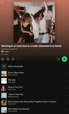 an app with music player on the screen, and two people dancing in the background