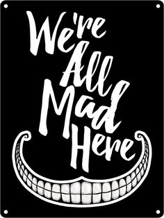 we're all mad here sign with an evil smile on the front and bottom