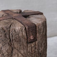 a close up of a piece of wood that looks like a cross