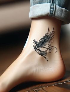 a woman's foot with a tattoo design on the top and bottom of it