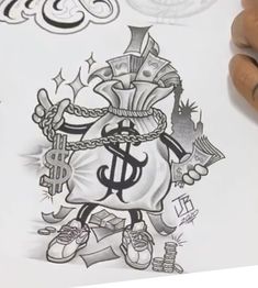 someone is drawing money bags with chains on paper