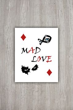 a piece of paper with the words mad love written in black and red on it