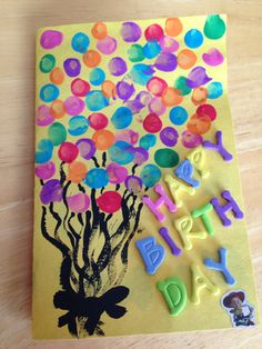 a child's handmade birthday card with balloons on it and the words happy birthday