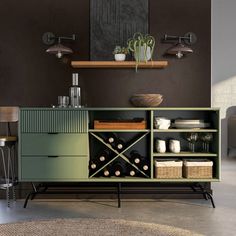 a green cabinet with wine bottles on it in a room that has brown walls and flooring