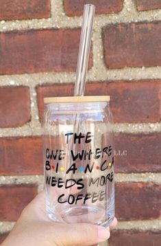 someone holding up a cup with a straw in it that says, the give wise brain needs more coffee