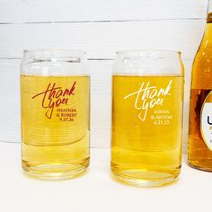 two beer glasses with the same label on them