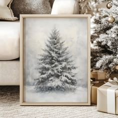 a christmas tree with snow on it in front of a couch and presents under the tree