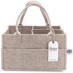 a wool bag with two compartments and a tag on the front that says derek's