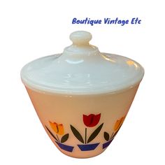 an image of a bowl with flowers on the front and bottom, in white background