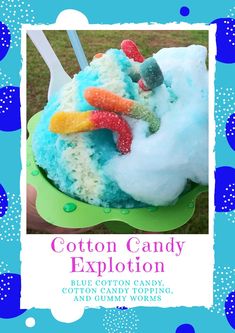 a blue cotton candy cake with carrots and gummy worms