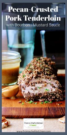 pork tenderion with bourbon mustard sauce on a cutting board