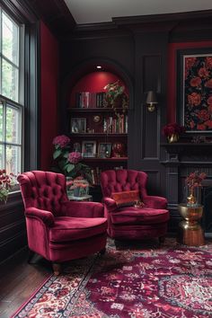 a living room with two chairs and a rug in front of a window that has bookshelves on it