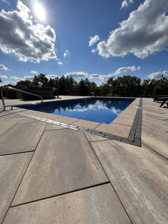 pool deck and kitchen design idea Modern Pool Deck, Permeable Pavers Driveways, Pool Deck Design, Kitchen Feature, Pavers Diy, Fire Pit Wall, Diy Patio Pavers, Beach Lounge Chair, Permeable Pavers