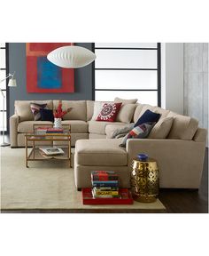 a living room scene with focus on the couch and coffee table in the foreground