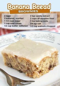 banana bread brownies with vanilla frosting on a white and blue plate next to a fork