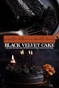 a black velvet cake on a plate with candles